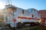 CBQ 13555 wearing fresh paint and lettered for CB&Q this ex EJ&E caboose is on display at the Monroe County Historical Society 